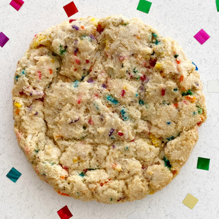 Vegan vanilla cookie filled with colourful sprinkles.